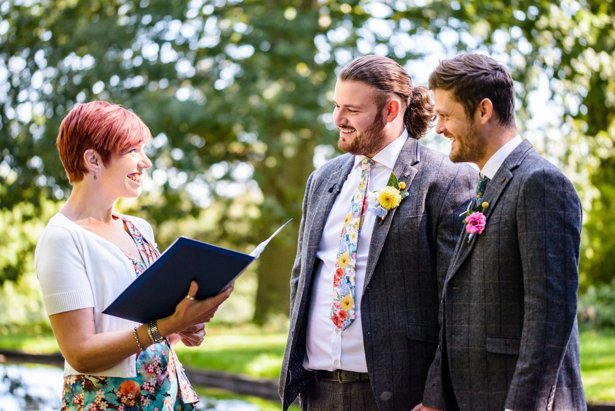 Celebrant and two male marriers